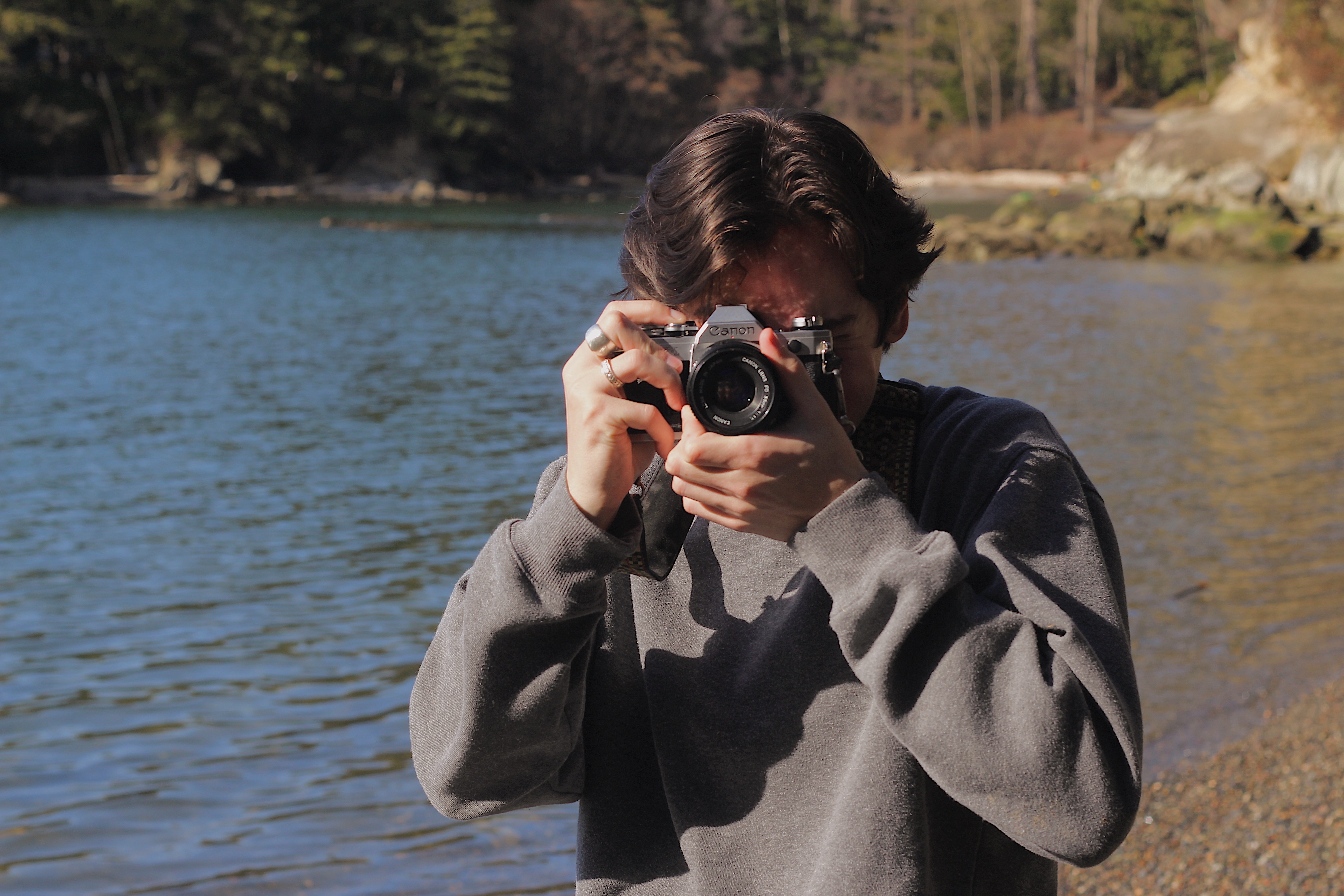 Event photographer taking a photo outdoors