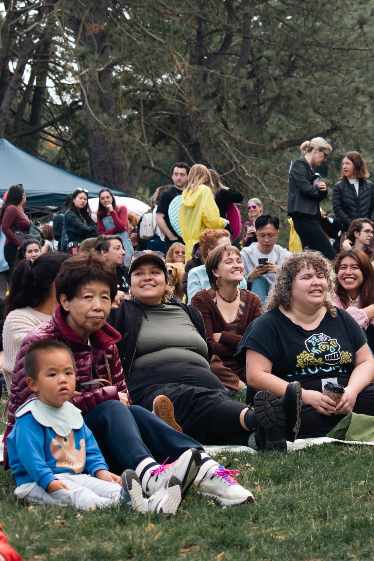 Families gathered together at an outdoor community event